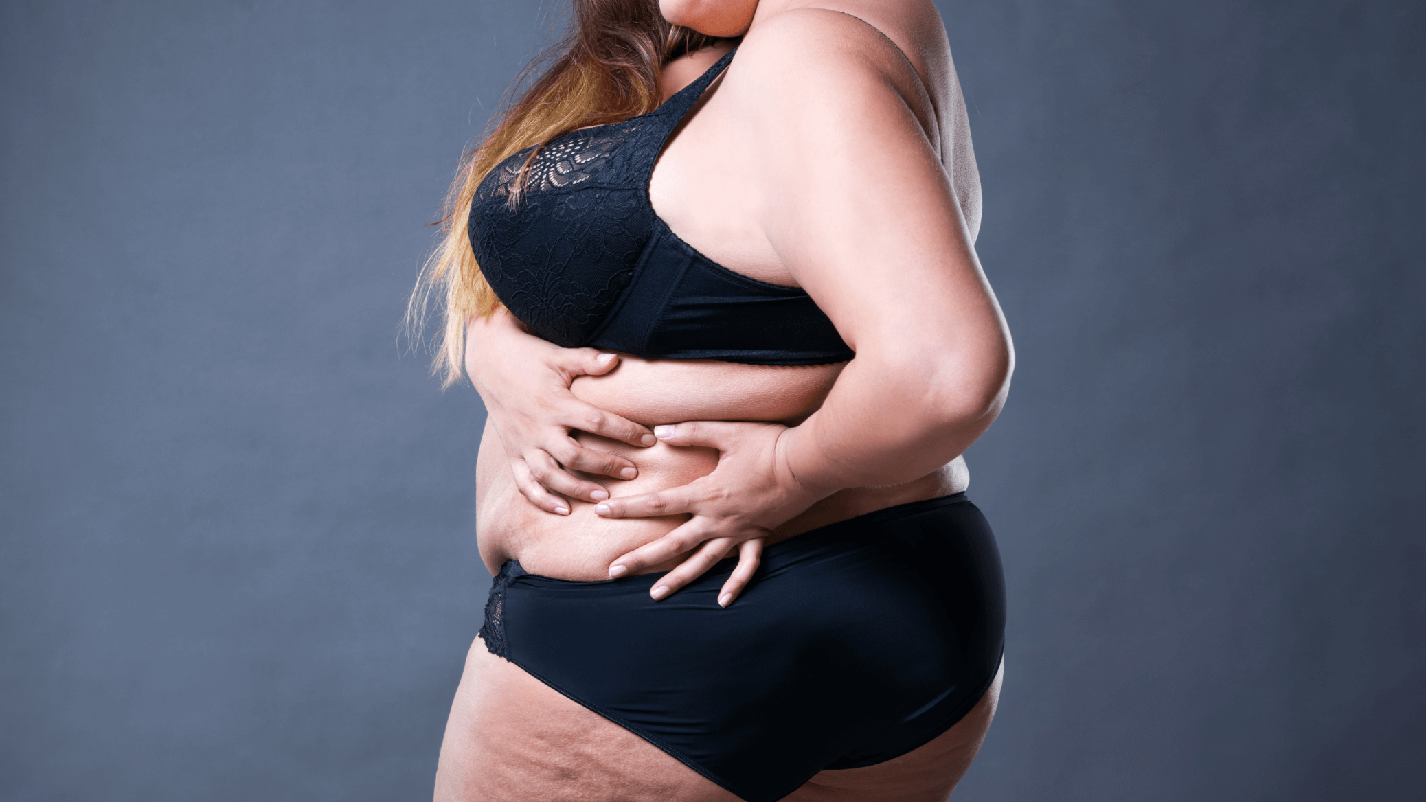 woman holding the side of her
